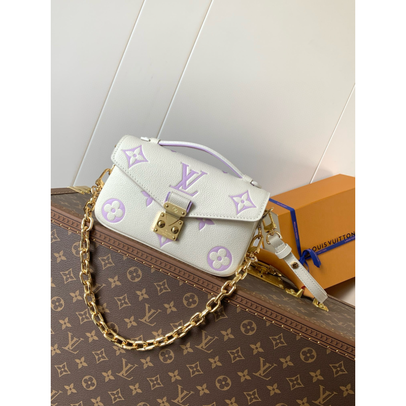 M23940 Pochette Métis East West